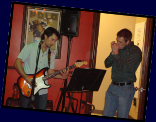 Patrick jamming with jason on harp, at a Polo Grill gig, early 2009