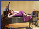 I've ALWAYS wanted to sing in an evening gown while laying on a grand piano!  (Sr. Recital, UNR, 2003)